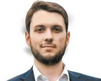 Роман Юнеман, политик